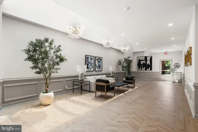 a view of a building with potted plants