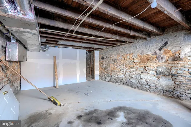 a view of a room with wooden walls