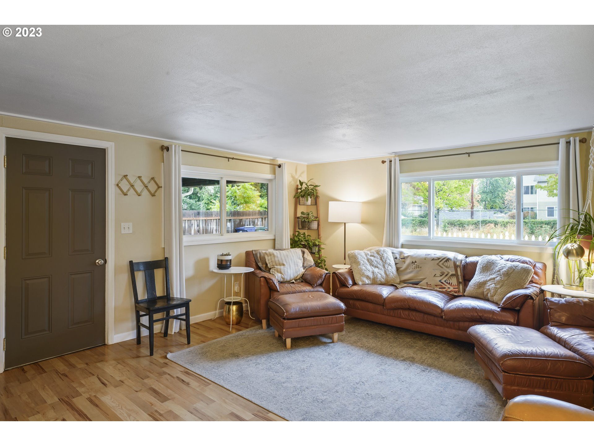180 S Street Springfield, OR 97477 - Photo 6 of 35 a living room with furniture and a large window