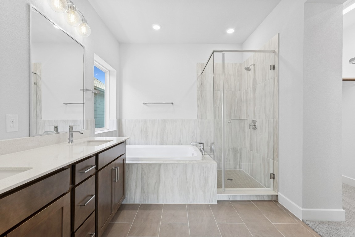 829 Nadal Path Round Rock, TX 78664 - Photo 15 of 37 Owner's Bathroom