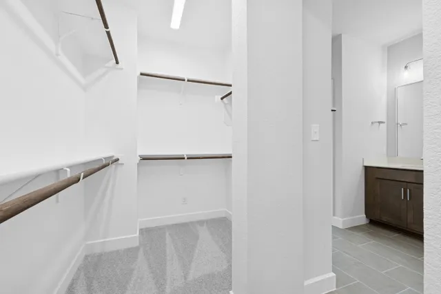 a view of an empty walk in closet