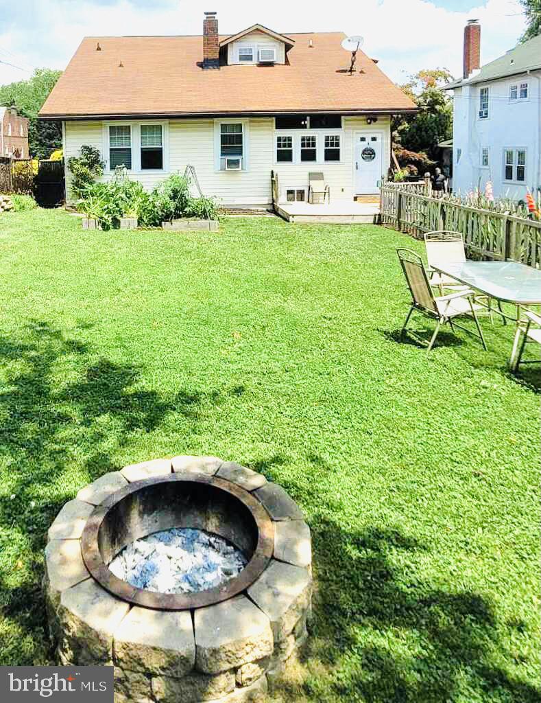 736 Braeside Road Baltimore, MD 21229 - Photo 28 of 29 Built in firepit in stunning yard