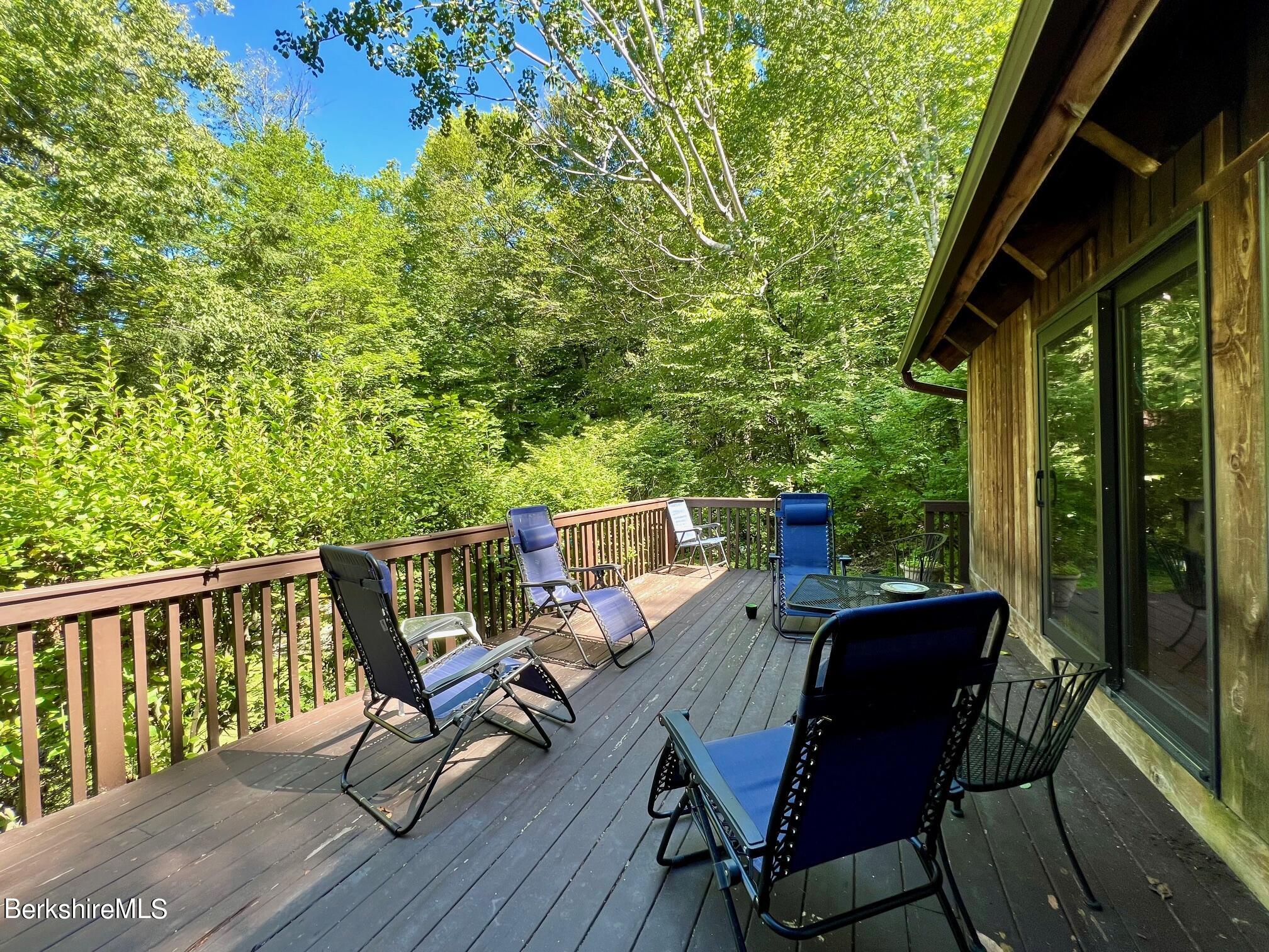 46 Cooper Creek Road Tyringham, MA 01238 - Photo 20 of 54 Summer view of front deck