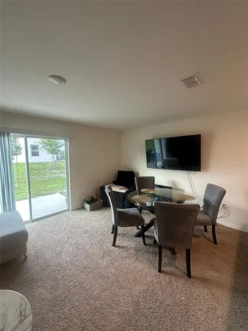 a workspace with furniture and a window