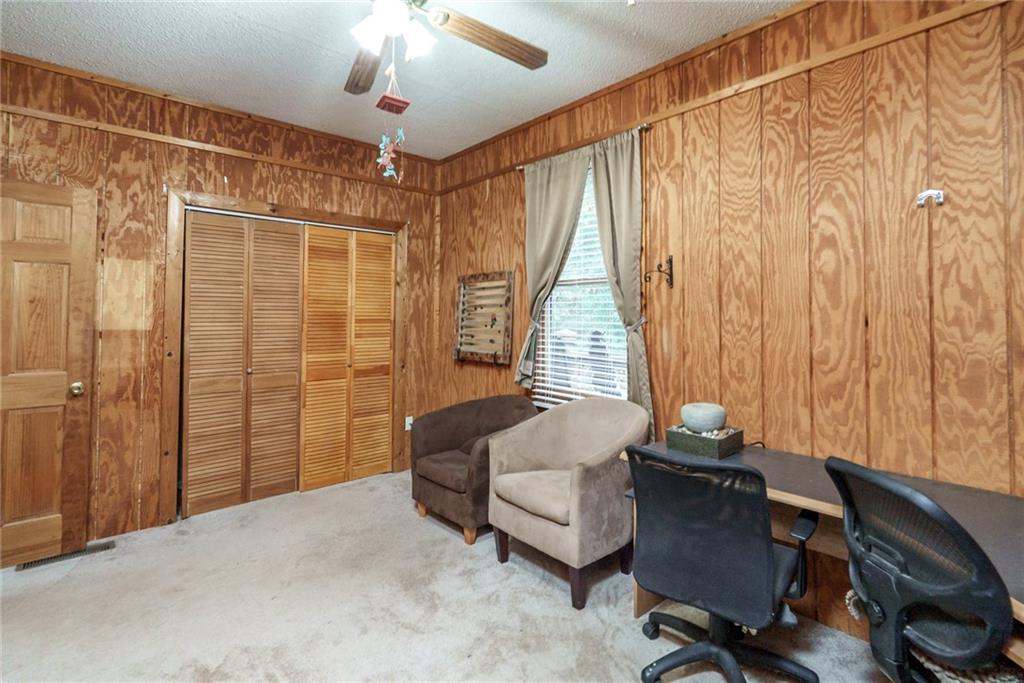 1840 Double Springs Church Road Monroe, GA 30656 - Photo 27 of 73 a bedroom with furniture and a window