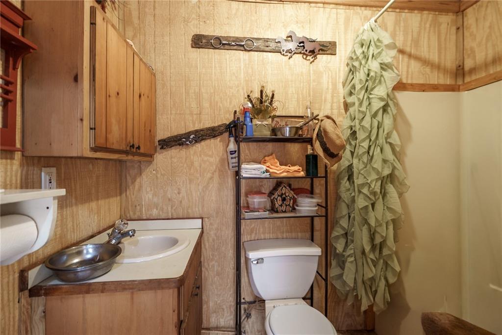 1840 Double Springs Church Road Monroe, GA 30656 - Photo 39 of 73 a bathroom with a sink toilet and shower