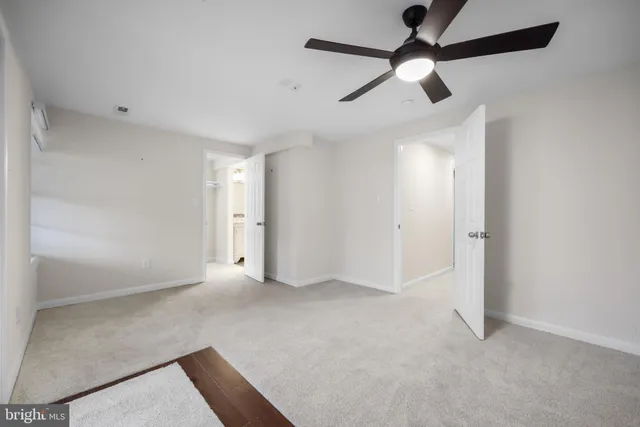 a view of walk in closet with window