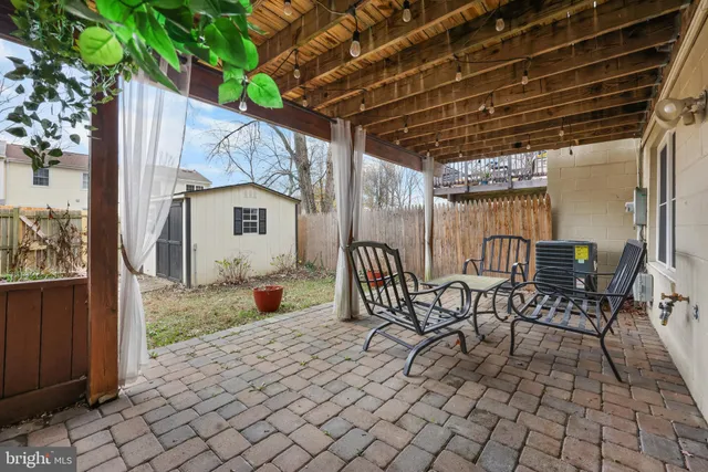 a outdoor space with a couch and chairs
