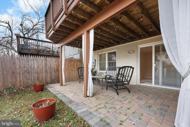 a backyard of a house with seating space