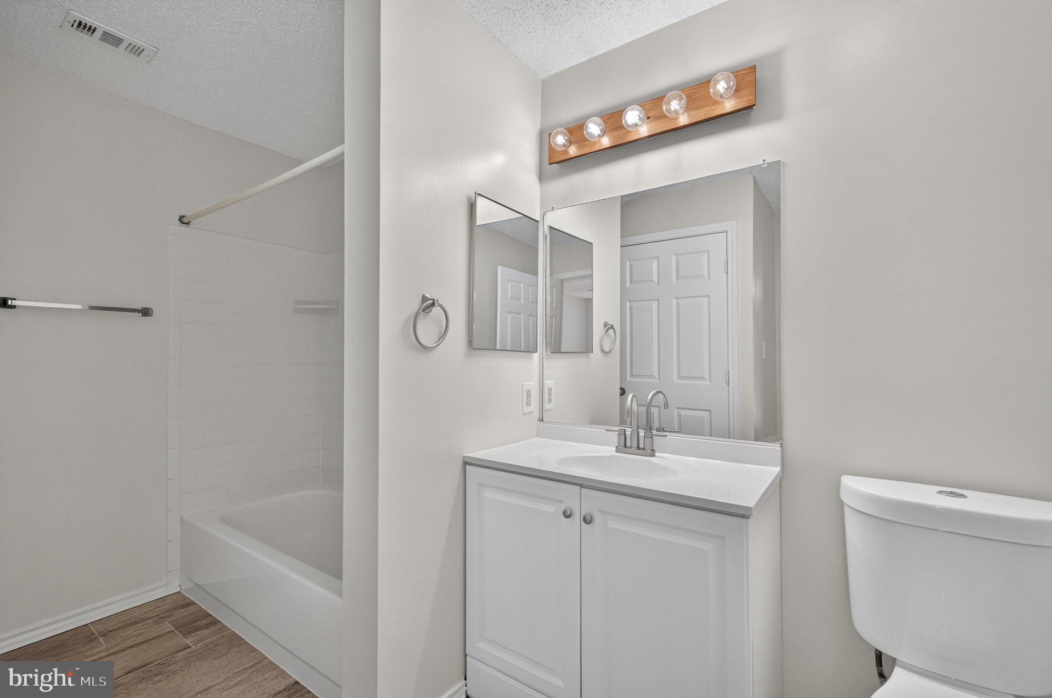 21029 Timber Ridge Terrace, Unit 302 Ashburn, VA 20147 - Photo 18 of 29 Modern bathroom with sleek finishes.