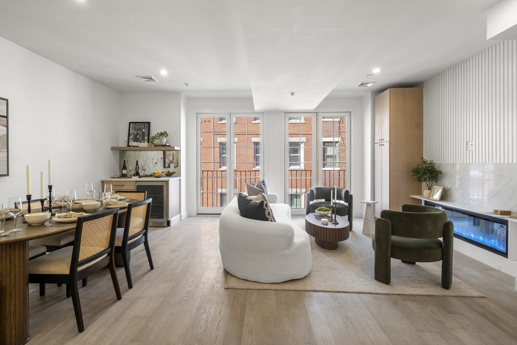51 North Margin Street, Unit 3 Boston, MA 02113 - Photo 5 of 19 a dining room with furniture and large windows