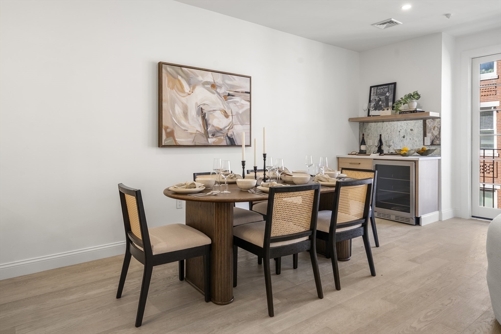 51 North Margin Street, Unit 3 Boston, MA 02113 - Photo 6 of 19 a dining room with furniture and window