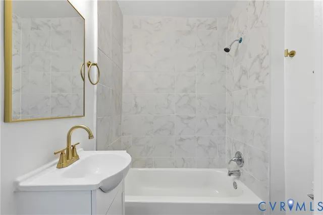 a bathroom with a sink and a shower