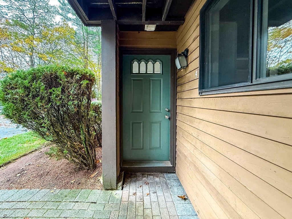 24 Wilson Street, Unit 4 Marlborough, MA 01752 - Photo 2 of 29 a view of a door and wooden floor