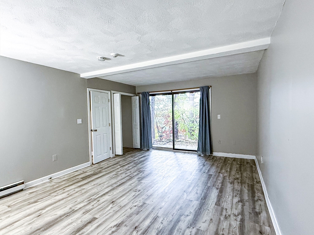 24 Wilson Street, Unit 4 Marlborough, MA 01752 - Photo 24 of 29 a view of an empty room and window