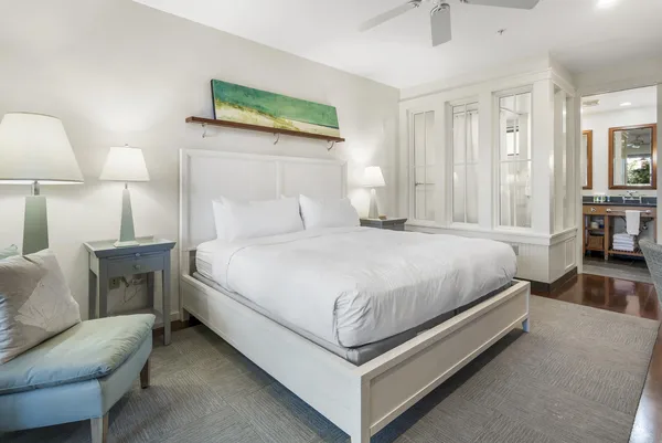 a bed room with a bed and a couch