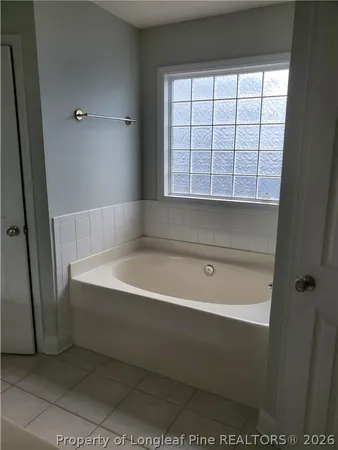 a bathroom with a bathtub