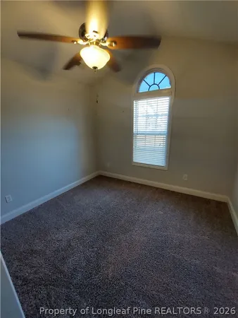 a view of a room that has a window in it