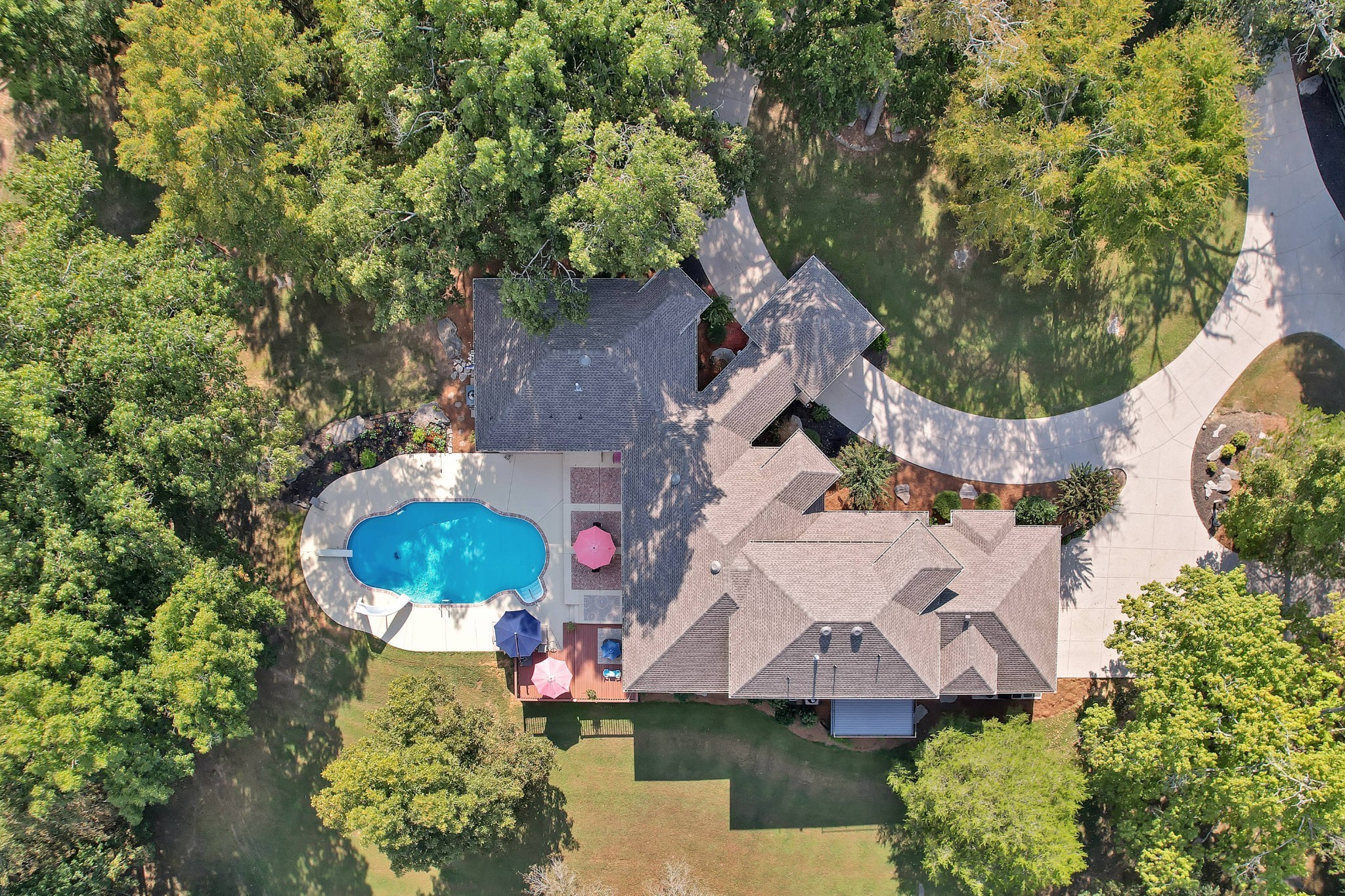 1745 Mann Road Lebanon, TN 37087 - Photo 1 of 47 an aerial view of a house with a garden