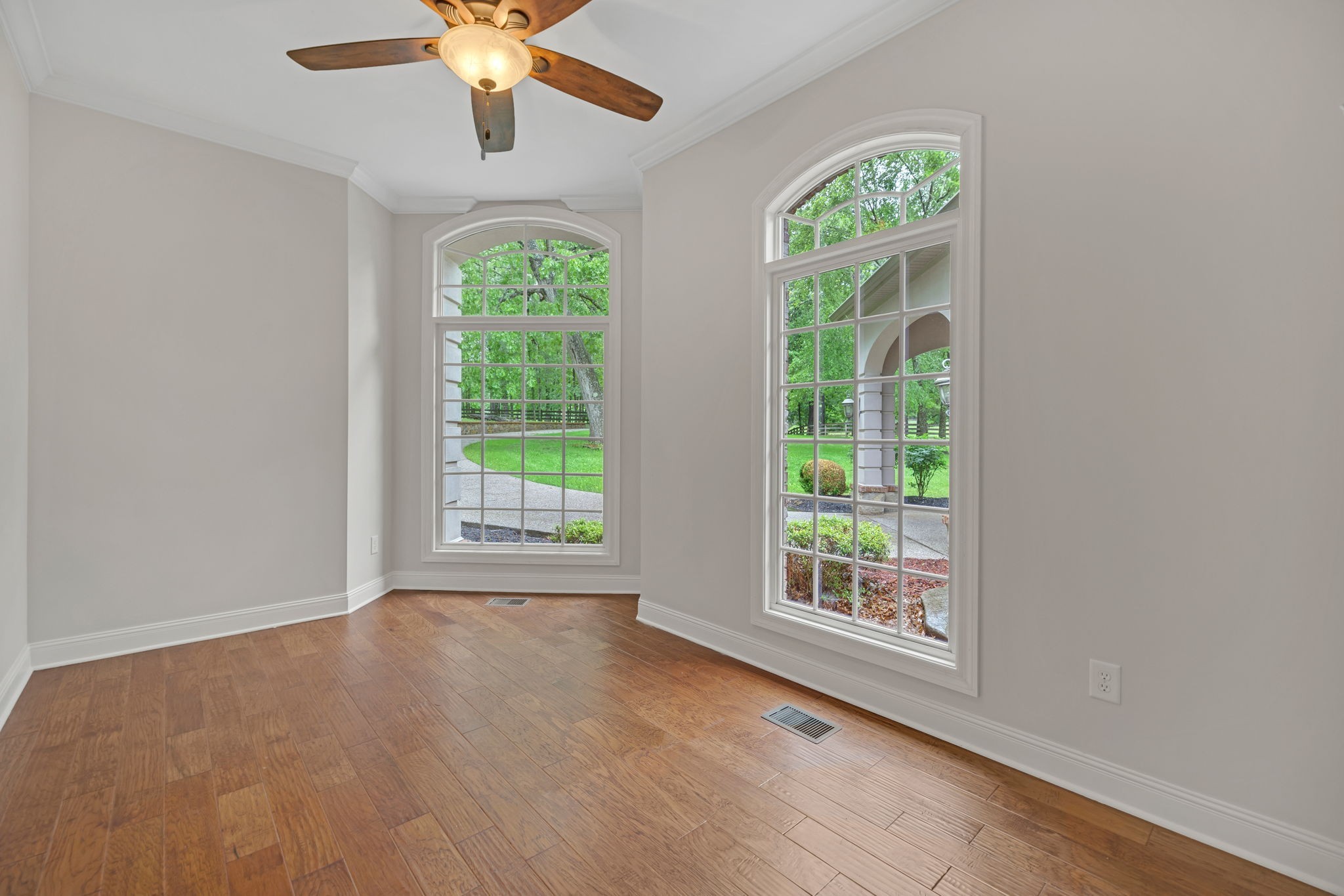 1745 Mann Road Lebanon, TN 37087 - Photo 21 of 47 a view of an empty room with wooden floor and a window