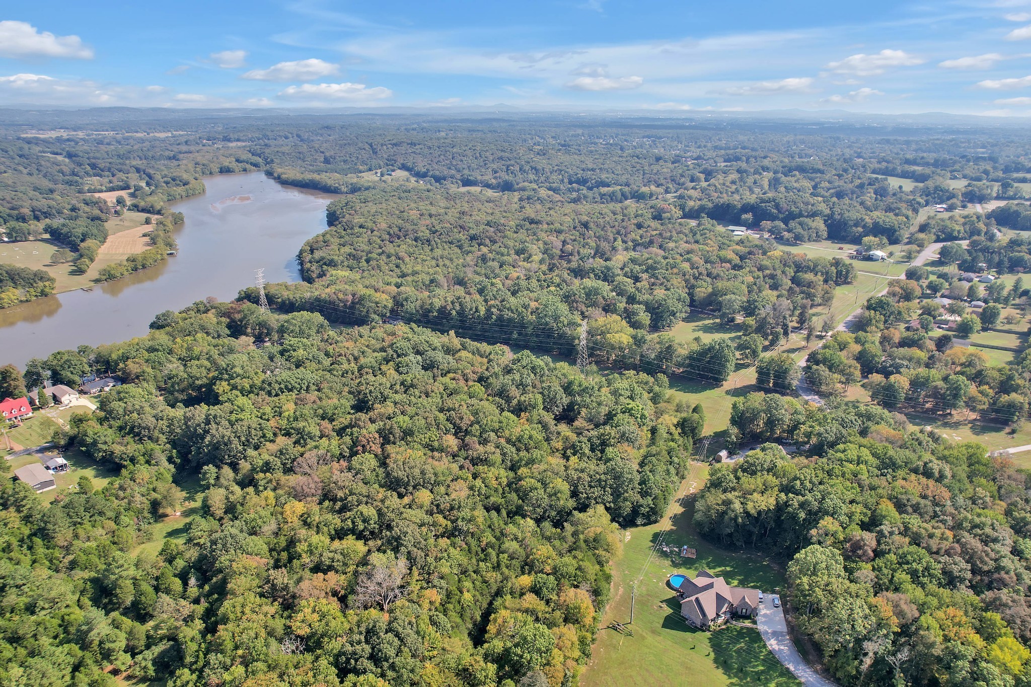 1745 Mann Road Lebanon, TN 37087 - Photo 46 of 47 an aerial view of a houses with a lake view
