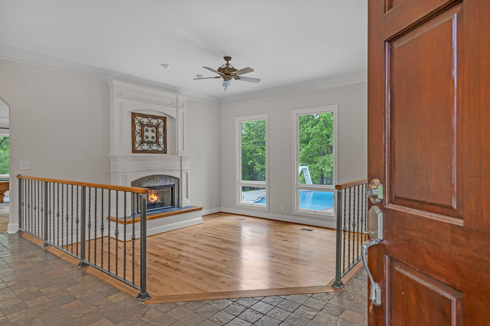 1745 Mann Road Lebanon, TN 37087 - Photo 6 of 47 a view of a livingroom with wooden floor and a ceiling fan