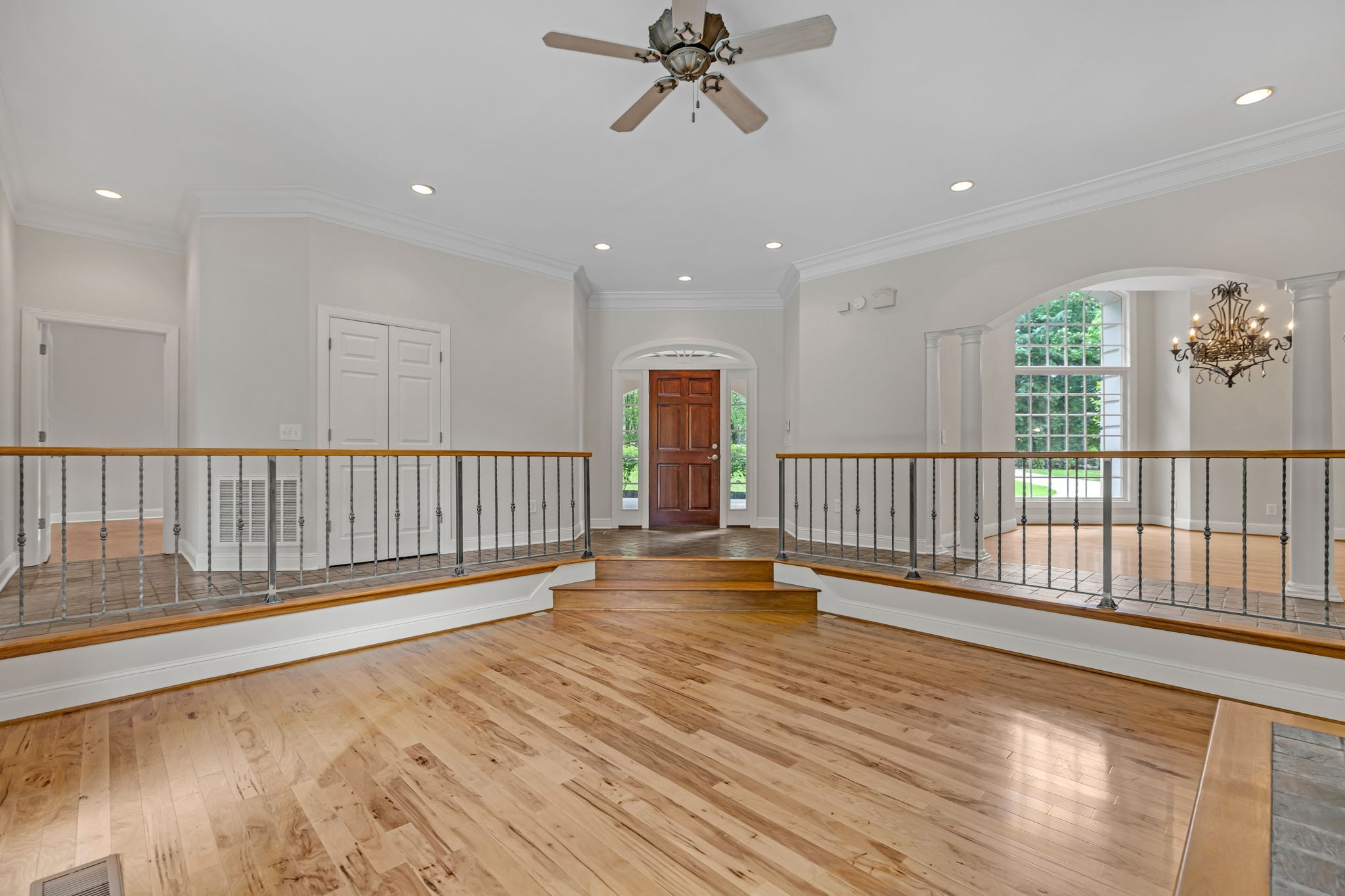 1745 Mann Road Lebanon, TN 37087 - Photo 8 of 47 a view of staircase with wooden floor and fan