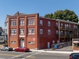 176 Ferry Street, Unit 3L Everett, MA 02149 - Photo 12 of 13 a front view of a building with street view
