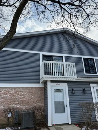 a front view of a house with balcony