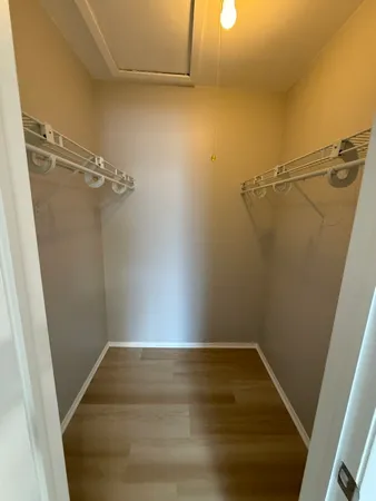a view of a room with racks on the wall