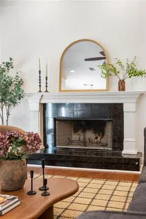 a living room with a fireplace