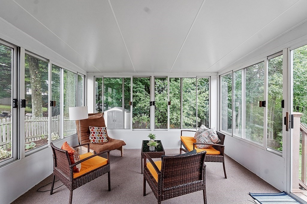 3 Neel Road Worcester, MA 01605 - Photo 12 of 41 a living room with furniture and a floor to ceiling window