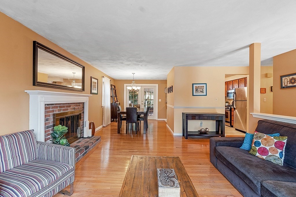 3 Neel Road Worcester, MA 01605 - Photo 9 of 41 a living room with furniture and a fireplace