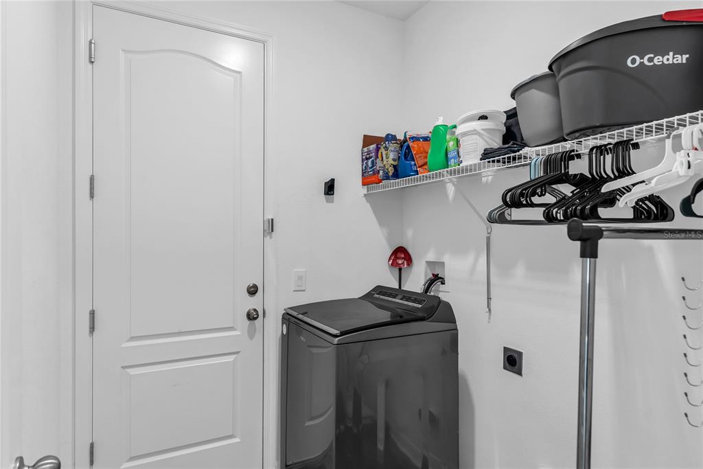 5816 Bar Ranch Road St. Cloud, FL 34771 - Photo 31 of 43 a room with storage and utility