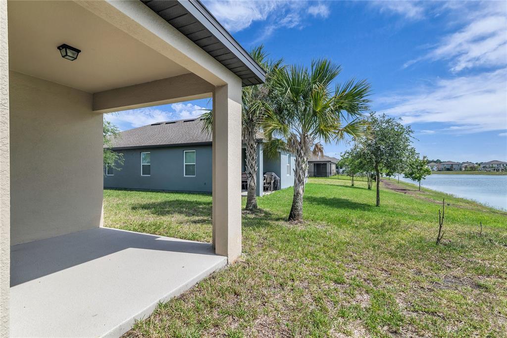 5816 Bar Ranch Road St. Cloud, FL 34771 - Photo 32 of 43 a view of a house with backyard