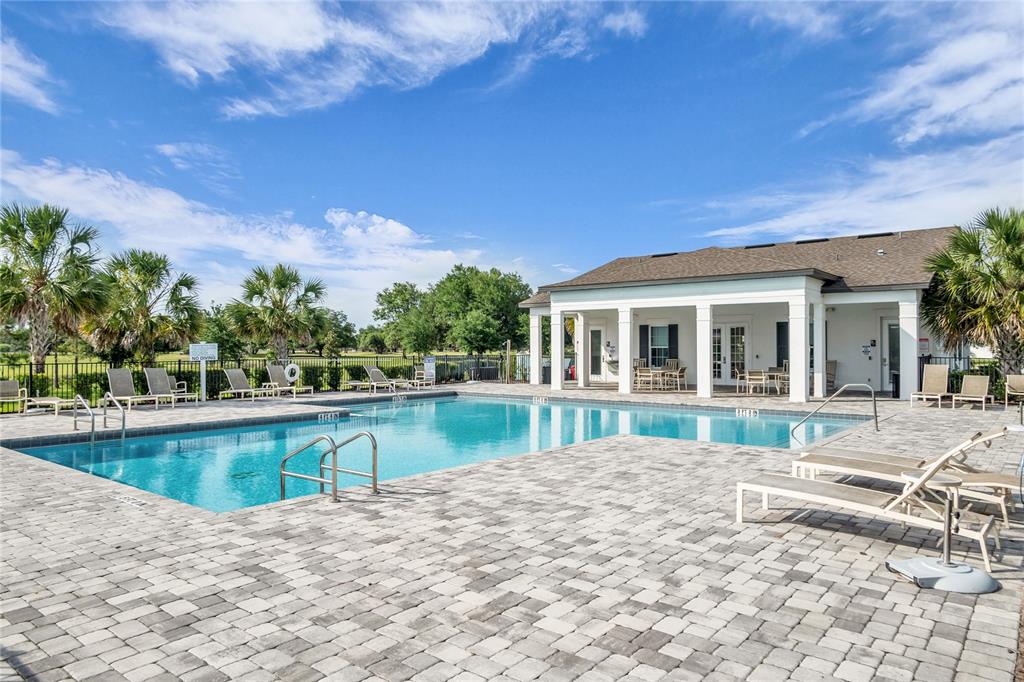 5816 Bar Ranch Road St. Cloud, FL 34771 - Photo 38 of 43 a view of a house with pool and sitting area
