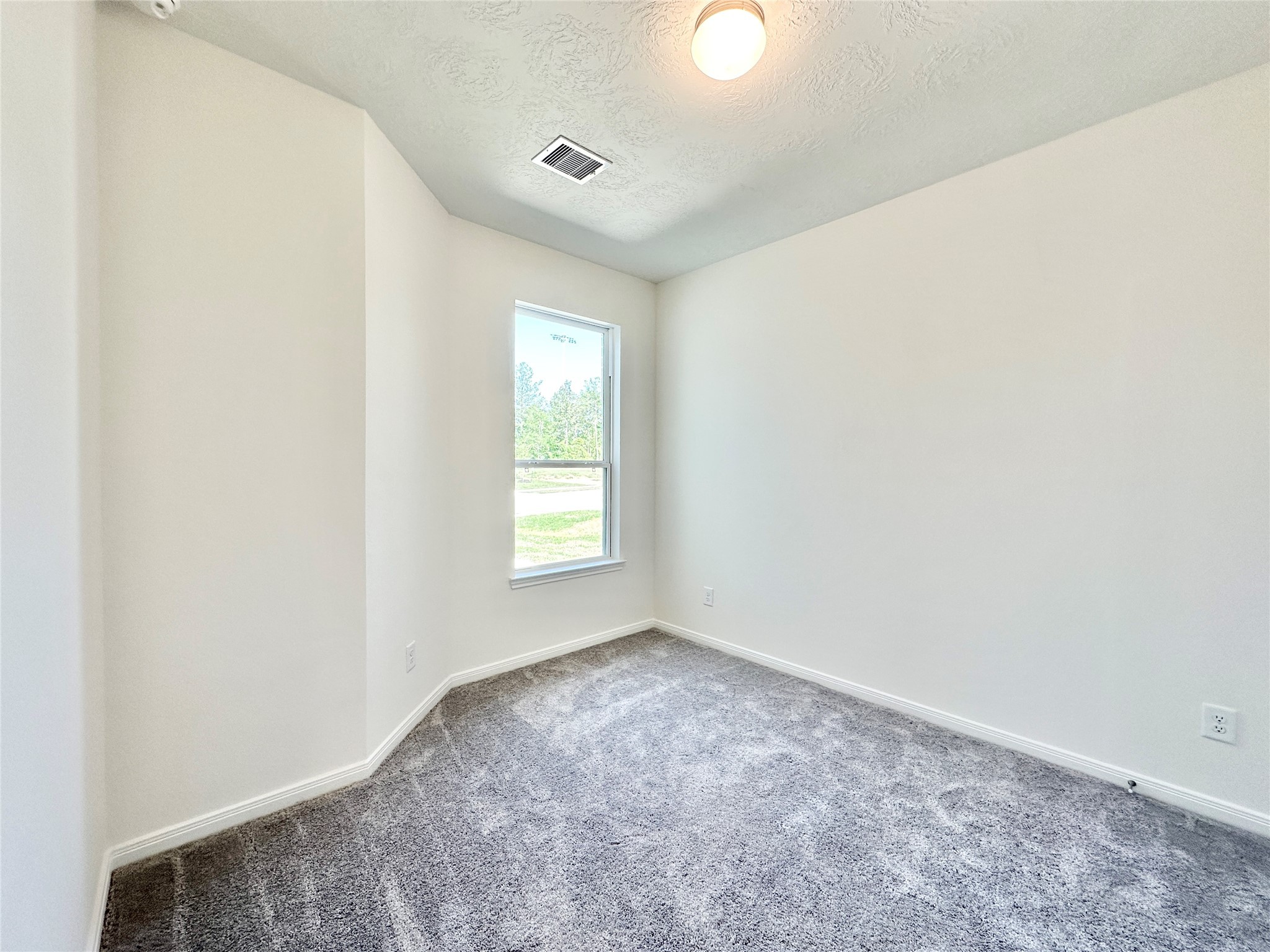 562 Broken Boulder Street Magnolia, TX 77355 - Photo 13 of 16 an empty room with a window