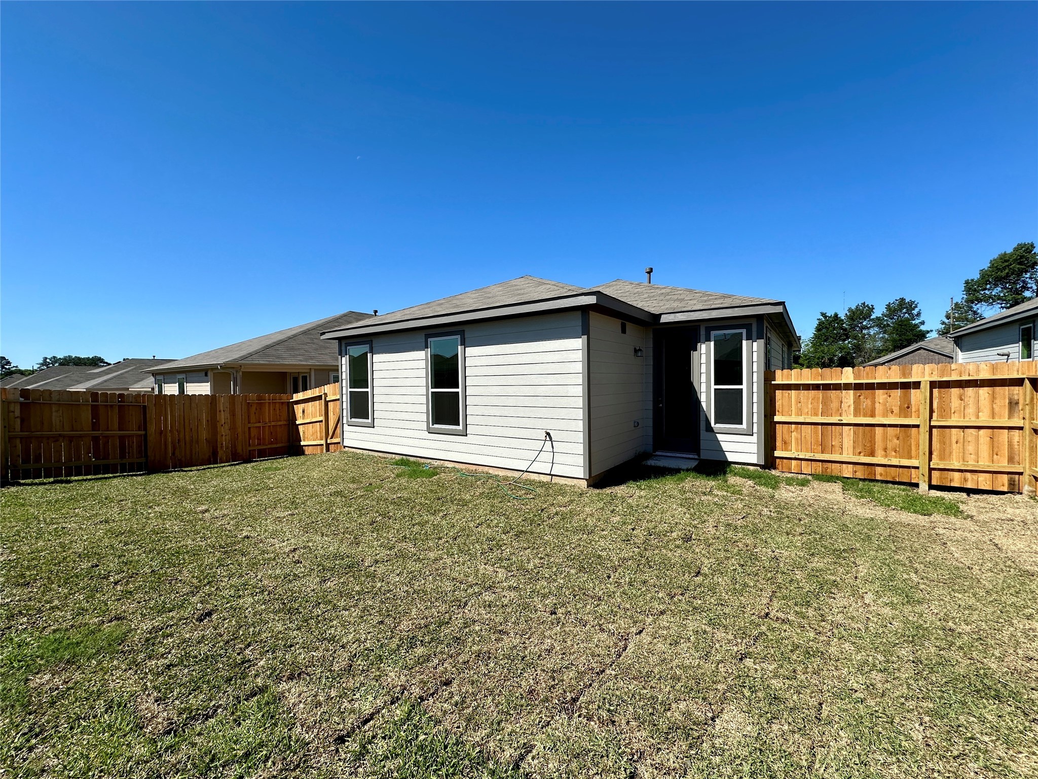 562 Broken Boulder Street Magnolia, TX 77355 - Photo 15 of 16 a house with a yard