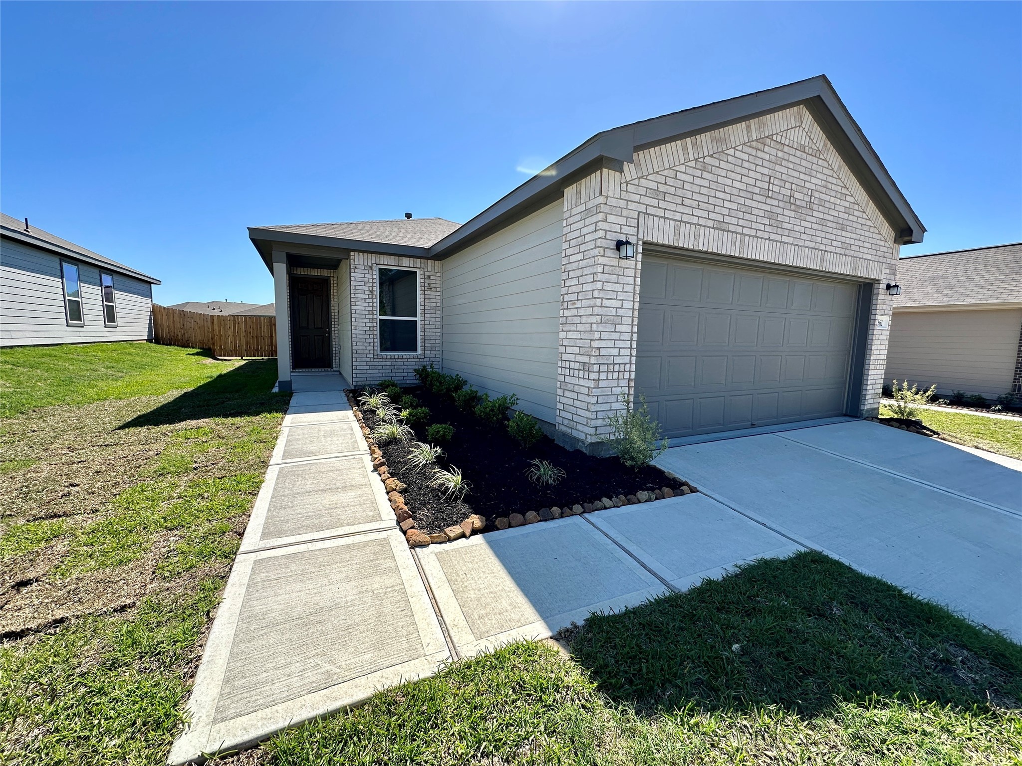 562 Broken Boulder Street Magnolia, TX 77355 - Photo 2 of 16 a front view of house with yard and green space