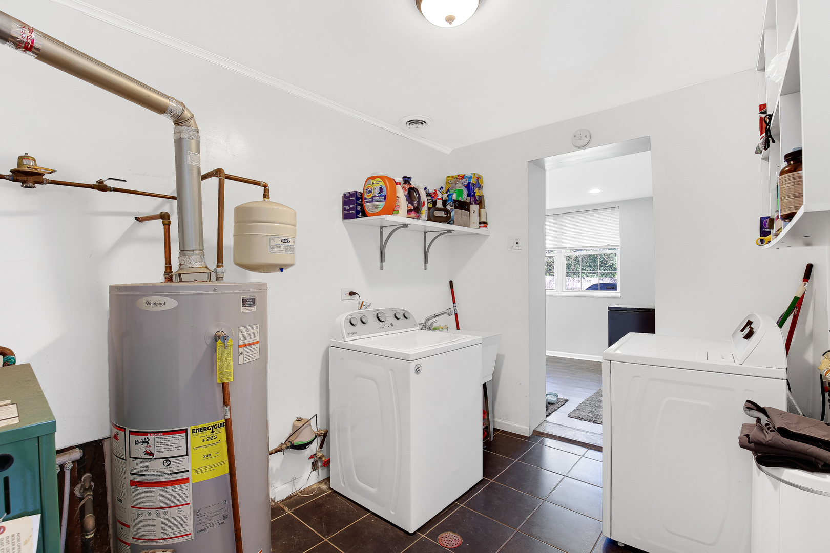 38 Monee Road Park Forest, IL 60466 - Photo 17 of 19 a view of living room with washer and dryer