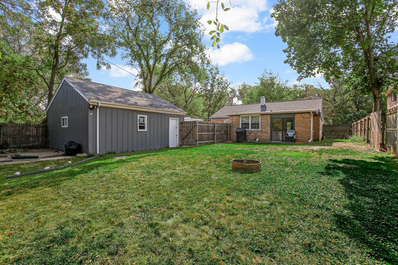 38 Monee Road Park Forest, IL 60466 - Photo 18 of 19 a view of a house with backyard and garden