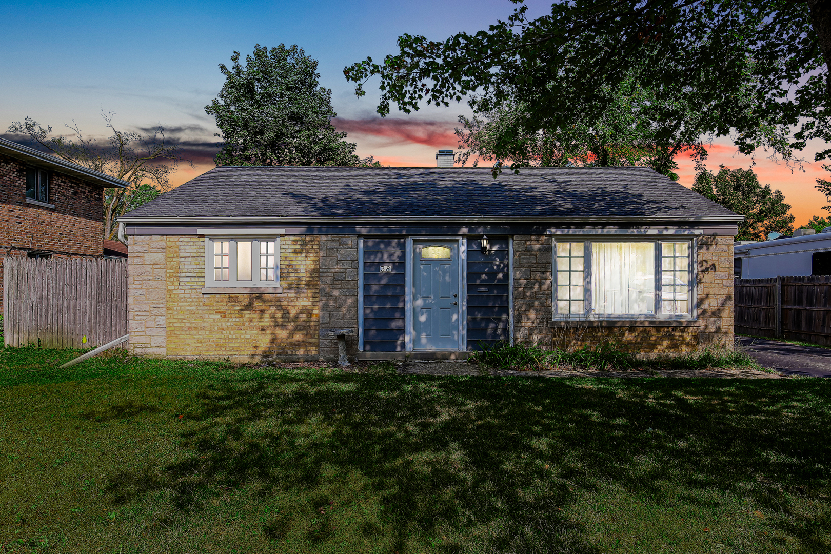 38 Monee Road Park Forest, IL 60466 - Photo 2 of 19 a front view of a house with a yard