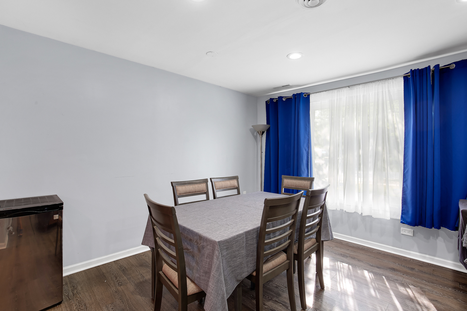 38 Monee Road Park Forest, IL 60466 - Photo 6 of 19 a view of a dining room with furniture and window