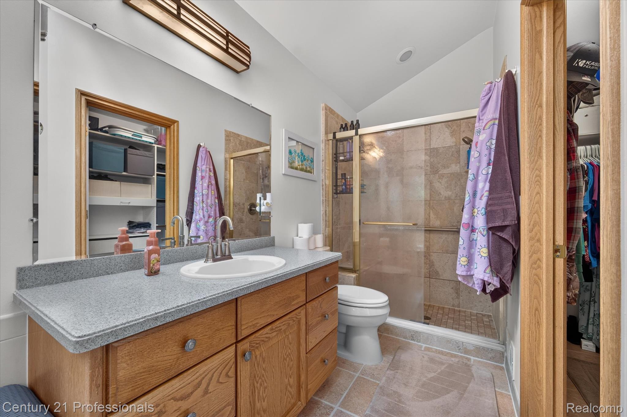 5675 36 Mile Road Romeo, MI 48065 - Photo 28 of 54 Primary bathroom, back around to your left is soaking tub and 2nd vanity. NOTE! large walk-in shower and walk-in closet on the right