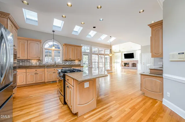 a view of a park with large trees