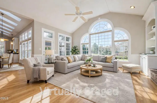 a view of a swimming pool with an outdoor space and seating area