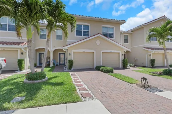 front view of a house and a yard