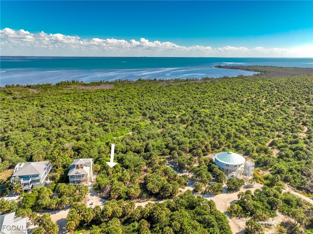 751 Rum Road Captiva, FL 33924 - Photo 17 of 29 a view of a room with an ocean and trees