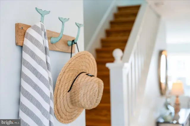 a kitchen with a refrigerator and a stove top oven
