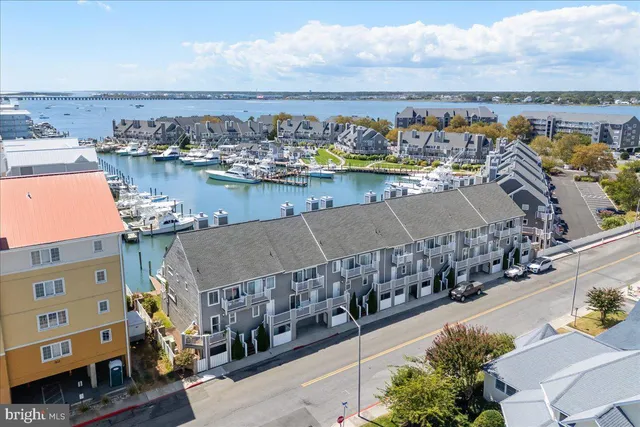 an aerial view of a house with a ocean view